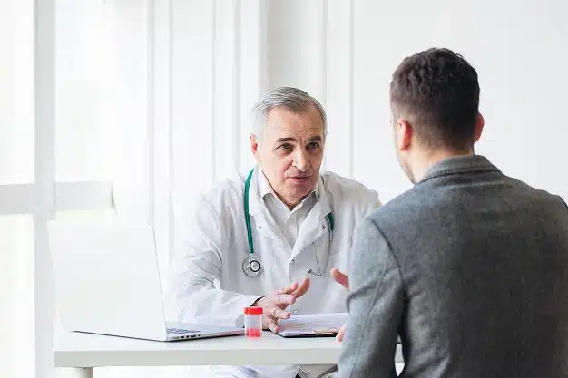 doctor-with-patient Doctor patient discussion