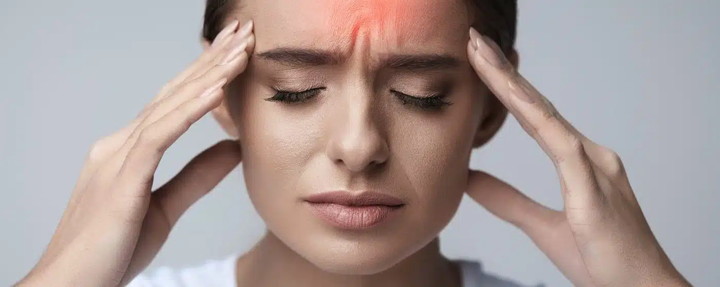headaches-edited-1400x558 man with back pain